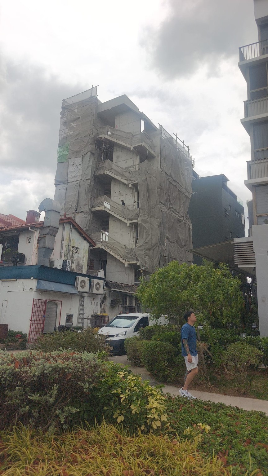 Exterior progress view of a multi-storey building under construction