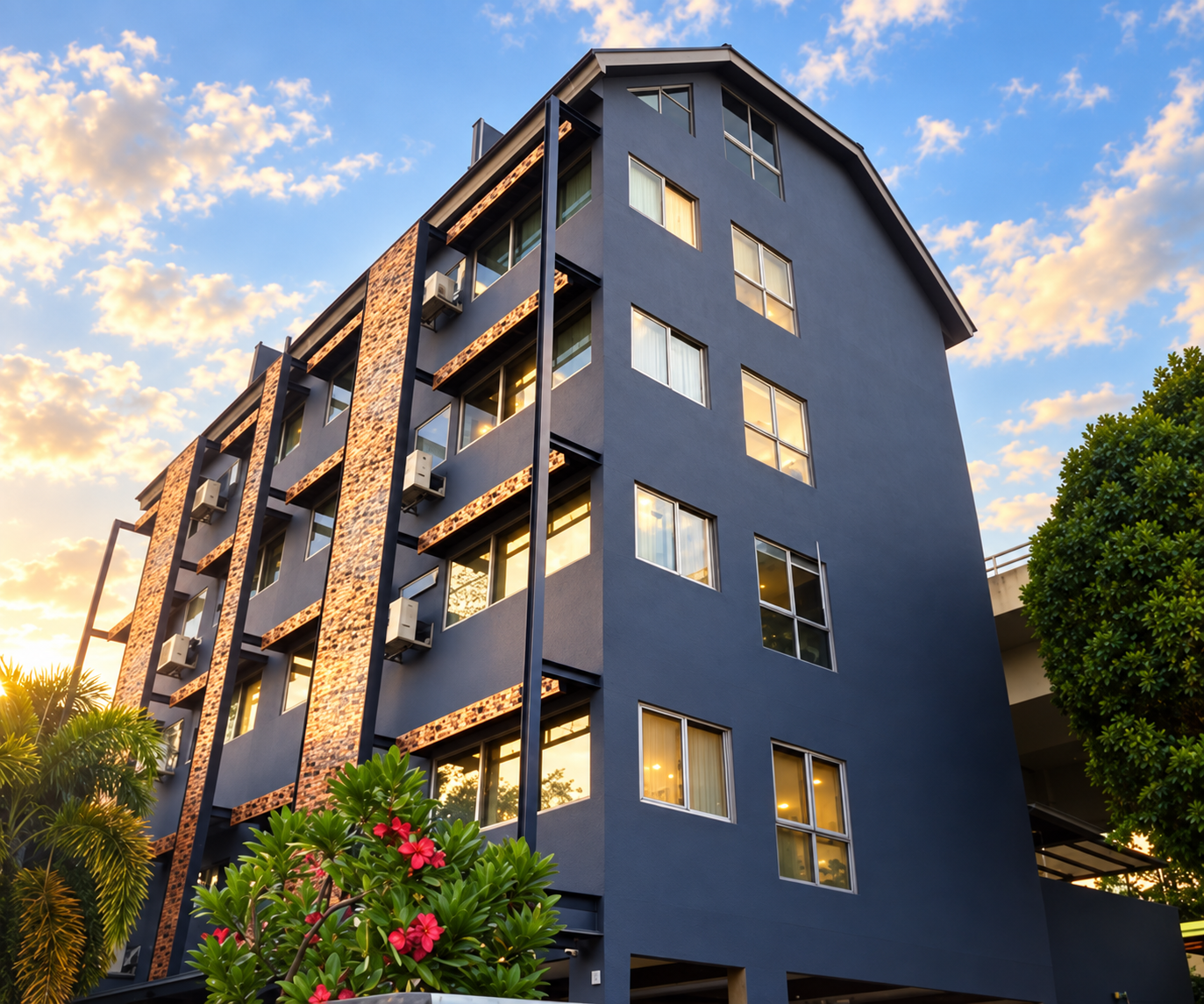 JJH Serviced Apartments building in warm late-afternoon light at Wolskel Road
