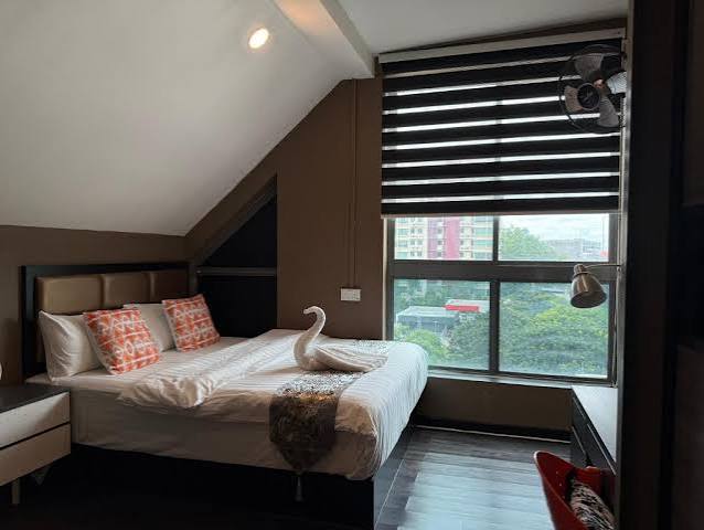 Bedroom at JJH Serviced Apartments